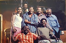 Vikram in 2005 at the film set of Majaa. Art Director M. Prabhaharan with cast & crew at Majaa set.jpg