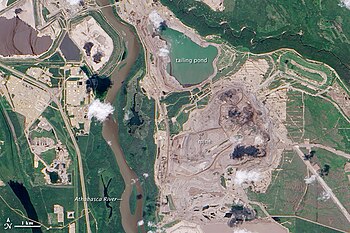 Mining operations in the Athabasca oil sands. Image shows the Athabasca River about 600m from the tailings pond. NASA Earth Observatory photo, 2009. Athabasca oil sands.jpg