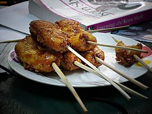 Banana cue, a popular street food from the Philippines, is made from fried saba bananas coated in caramelized sugar. Banana cue.jpg