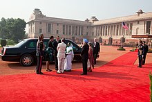 Barack and Michelle Obama met by President Pratibha Patil and the Prime Minister Manmohan Singh, together with their spouses, 8 November 2010. Foreign leaders in India are typically received at the Rashtrapati Bhavan, the official residence for the president of India. Barack and Michelle Obama are greeted by President Pratibha Devisingh Patil.jpg