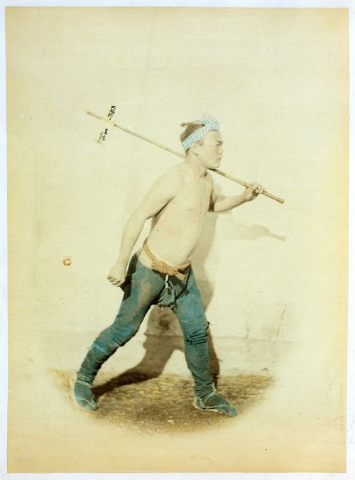 A hikyaku (courier or postman), Japan, hand-coloured albumen print by Felice Beato, between 1863 and 1877