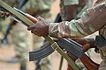 Soldier racks his AK-47 at Bembèrèkè 2009-06-16