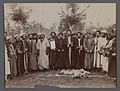 Brooklyn Museum - A Group of Religious Men in Religious Garb holding up a Piece of Calligraphy One of 274 Vintage Photographs.jpg