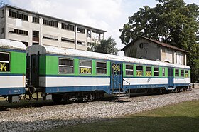 Voiture E.900 conservée comme monument dans l'ancienne gare de Castiglione Olona