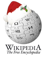 logo Wikipédia avec un bonnet de Père Noël