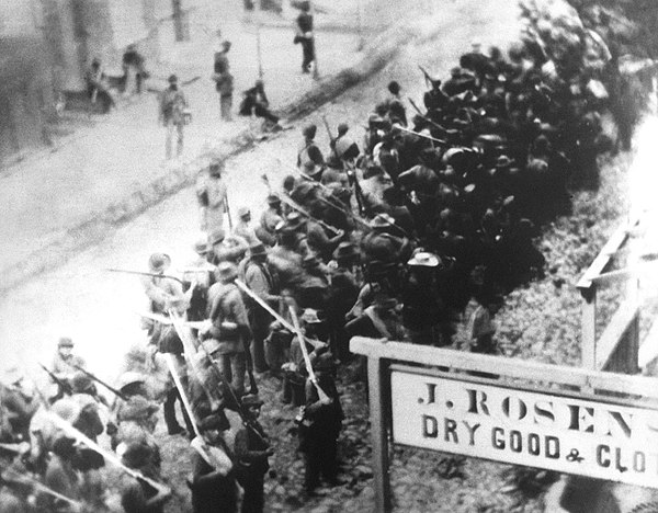 Confederate troops marching south on North Market Street in Frederick during the American Civil War