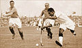 Dhyan Chand with the ball vs. France in the 1936 Olympic semi-finals.jpg