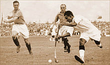 Dhyan Chand in action against France at the 1936 Olympic semi-finals Dhyan Chand with the ball vs. France in the 1936 Olympic semi-finals.jpg