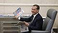 Dmitry Medvedev holding newspaper, May 2014.jpg