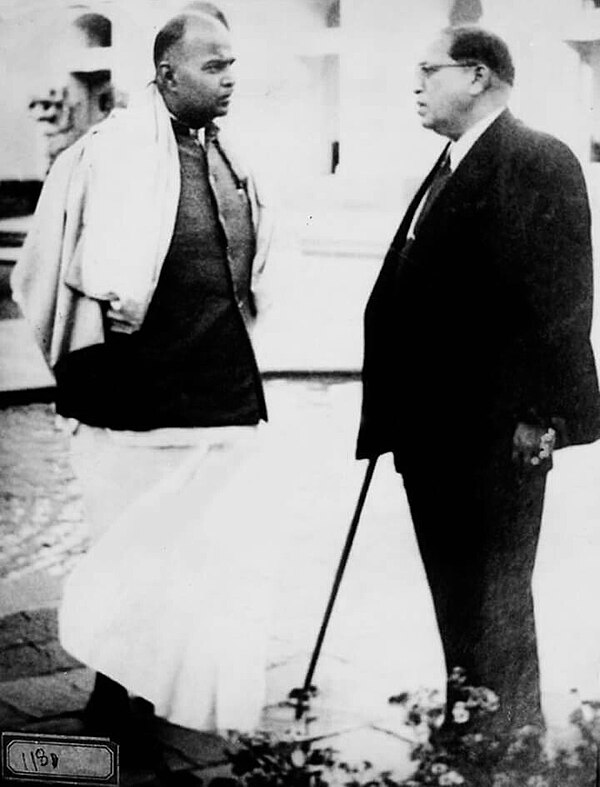 B. R. Ambedkar and Syama Prasad Mukherjee talking on the Campus of Parliament, 1951