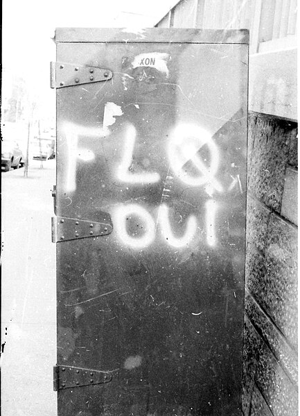 A mailbox in Montreal bearing the graffiti FLQ oui (FLQ yes) in July 1971. The FLQ conducted several bombings of post boxes which typically bore a dec