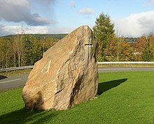 The Eden Millennium Monument, a 50 tonne inscribed stone, was placed overlooking Eamont Bridge in 2000 Eden Millennium Monument, Eamont Bridge.jpg