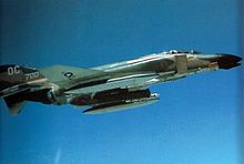 A 13th TFS F-4D over Vietnam in 1971, carrying a Pave Sword laser pod. F-4D 13th TFS with Pave Sword laser over Vietnam 1971.jpg