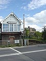 Finningley Signal Box between Lincoln and Doncaster. Note remains of closed station in background.