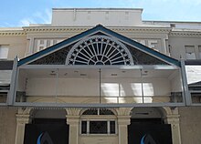 The glazed awning spans the facade. The three-arched main entrance is visible below this section. Former Hippodrome, Brighton (Glazed Awning over Entrance).jpg