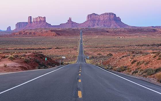View of Monument Valley in Utah, looking south on U.S. Route 163 from 13 miles (21 km) north of the Utah-Arizona state line