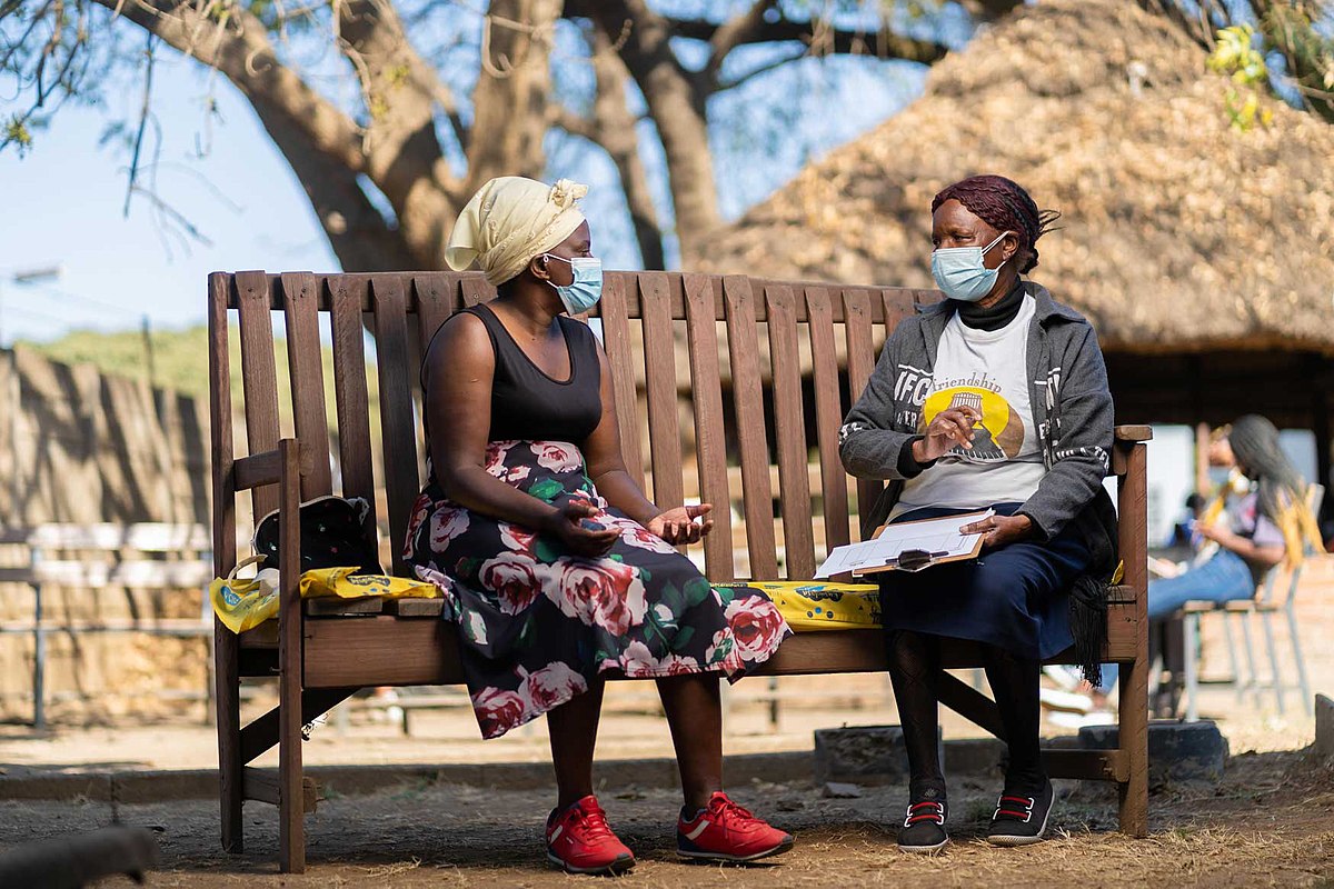 people on bench