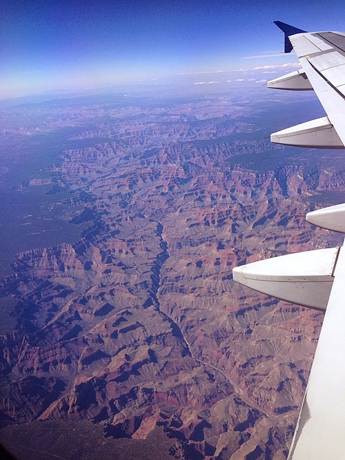 The Grand Canyon from an airplane, with the Colorado River visible