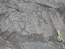 Hawai'i Volcanoes National Park Hawaii petroglyph men.jpg