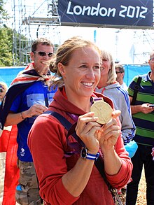Helen Glover won the British Women's National Superstars Championship during the 2012 Olympic Superstars edition of the show. Helen Glover with 2012 Olympic Gold medal.jpg