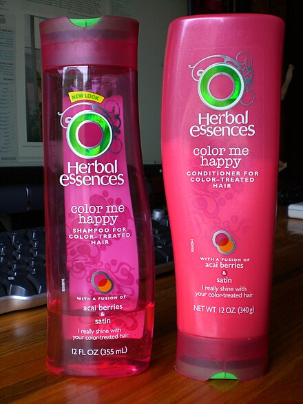 A bottle of modern-day hair conditioner by Clairol (right).