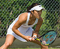 Hiroko Kuwata competing in the first round of the 2015 Wimbledon Qualifying Tournament at the Bank of England Sports Grounds in Roehampton, England. The winners of three rounds of competition qualify for the main draw of Wimbledon the following week.