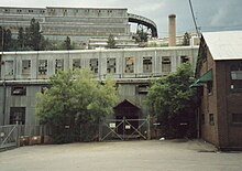 Homestake Mine buildings in 1991 Homestake Mine now (2016) the Sanford Underground Research Center.jpg