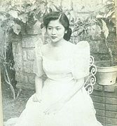 A young Imelda Marcos wearing terno type of Maria Clara.