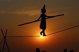 Indian tightrope girl performing folk art Baunsa Rani.jpg
