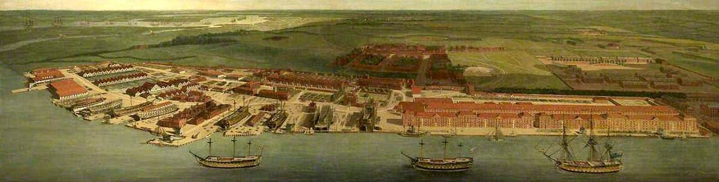 Chatham Dockyard: from right to left (south to north) on river bank are: two Anchor Wharf Storehouses (Rope House behind); two shipbuilding slips (and Commissioner's House with garden, and beyond, Sail and Colour Loft); two dry docks (Clock Tower Storehouse behind); the old Smithery; two more dry docks (and beyond, Masthouses and Mouldloft); more building slips and Boat Houses. In the distance, ships at anchor on Gillingham Reach. Painting by Joseph Farington, 1785.