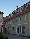 Residential house with basket arch door