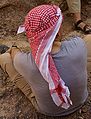 A man wearing a traditional Bedouin Keffiyeh.