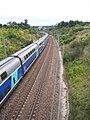 English: A TGV going towards Paris, on LGV Interconnexion Est, in Villecresnes, Val-de-Marne, France. Picture taken looking in the direction of Paris. Français : Un TGV se dirigeant vers Paris, sur la LGV Interconnexion Est (branche ouest annexée par la LGV Sud-Est), à Villecresnes, Val-de-Marne, France. La photo regarde vers Paris. Camera location 48° 43′ 19.4″ N, 2° 33′ 08.18″ E  View all coordinates using: OpenStreetMap