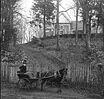 Lady Adela Goff 1895. She is in a pony trap with St Mary's Church in the background. Lady Adela Goff 1895.jpg