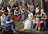 Lehi (far right, bearded) bestowing a blessing on his family. At least 21 different figures are visible (inclusive of infants and children). There is a mix of men, women, and children. A man in blue appears to be writing, perhaps transcribing what Lehi is saying. One infant is nursing. Several men have beards. All but the children wear hats or scarf-like head coverings. The fashion and style is reminiscent of nineteenth-century Christian art of Old Testament scenes. There is a vibrancy of color, with clothing in blues, greens, whites, and reds. The family gather in something like a circle, on a green, grassy field. There are tents visible in the background. This is cropped from a full version of the scene.
