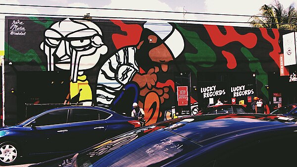 A mural of Yancey (center) and MF Doom (left) in the Wynwood neighborhood of Miami, Florida, painted in the style of Peanuts