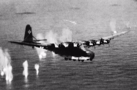 Photograph of Luftwaffe Me 323 being shot down by a Martin B-26 Marauder of 14 Squadron RAF, Northwest African Coastal Air Force near Cap Corse, Corsica.
