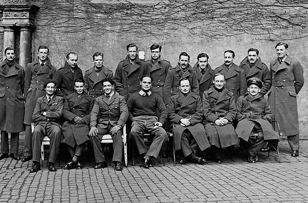 RAF group photograph at Colditz. Back row, from left to right: F/Lt Best, F/Lt Forbes, F/Lt Zafouk, F/Lt Flinn, F/Lt van Rood, F/Lt Halifax, F/Lt Dona