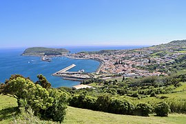 The City of Horta and Horta Bay, as seen from the Nossa Senhora da Conceição outlook, showing the marina, the old dock, and volcanic cones, Monte Escuro and Monte da Guia.