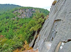 The inscription of the Karabel rock-carved prince-warrior monument in Mount Nif was read as attributing it to "Tarkasnawa, King of Mira", a part of the Kingdom of Arzawa. NejdetDuzen KarabelHittiteLuwianMonumentCarvedinRockKemalpasaTurkey.jpg