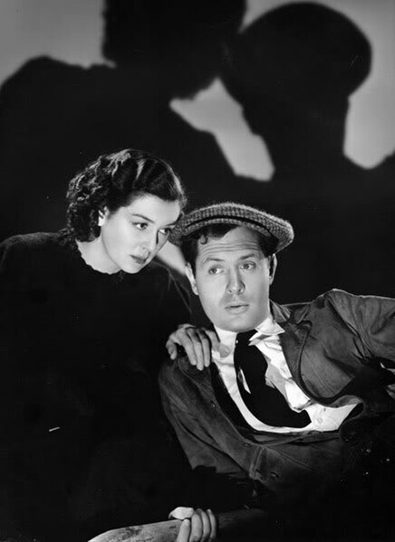 Rosalind Russell and Robert Montgomery in Night Must Fall (1937)