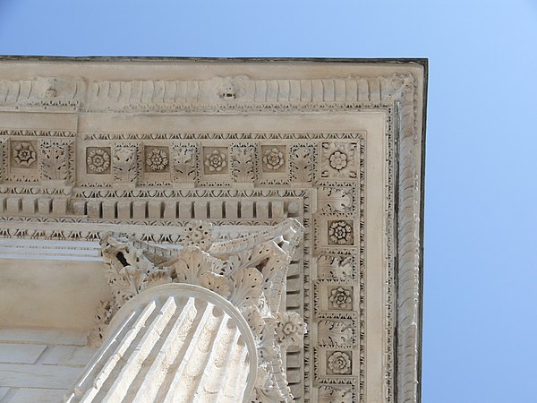 Cornice of Maison Carrée (Nîmes, France), a Roman temple in the Corinthian order, with dentils nearest the wall.