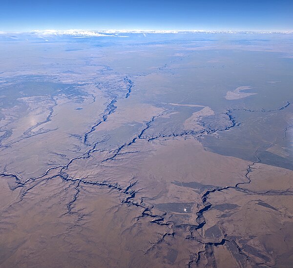 Aerial view of the Owyhee River in Oregon, and looking southeast into Idaho, with the Three Forks Recreation Site at left