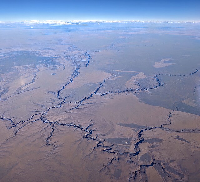 Aerial view of the Owyhee River in Oregon, and looking southeast into Idaho, with the Three Forks Recreation Site at left