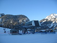 A Poma fixed grip Alpha model chairlift at the Summit at Snoqualmie, Washington, USA Poma Fixed Grip Chairlift Snoqualmie Washington.jpg