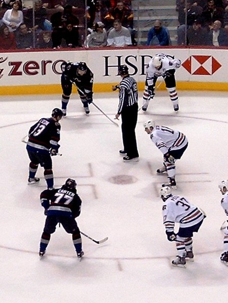 Henrik and Daniel Sedin, along with Anson Carter, prepare to face the Edmonton Oilers in December 2005.