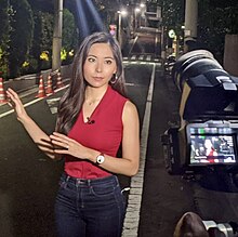 Selina Wang reporting outside Polish Embassy in Tokyo August 2, 2021 (cropped).jpg