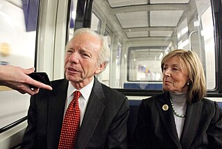 Senator Joe Lieberman rides the subway to the Capitol with his wife Hadassah in 2011