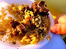 Bariis iskukaris, a Somali camel meat and rice dish Somalicamelmeat.jpg