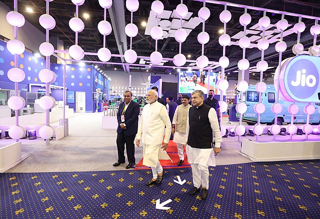 Prime Minister Narendra Modi visits the stall of Jio with Ashwini Vaishnaw, Minister of Railways and Communications along with Mukesh Ambani and Akash